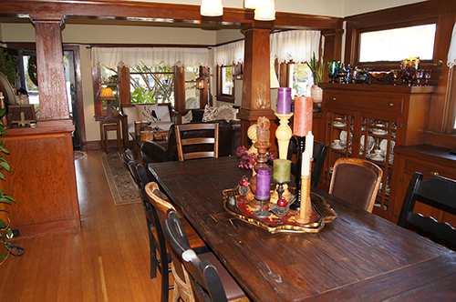 click to view larger image Tapered Craftsman pillars separate a living room and dining room. Martinez, CA.